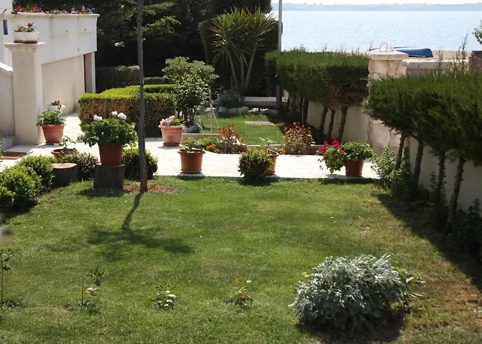 Апартаменты Family Friendly Seaside Apartments Vrsi - Mulo, Zadar - 6155 *